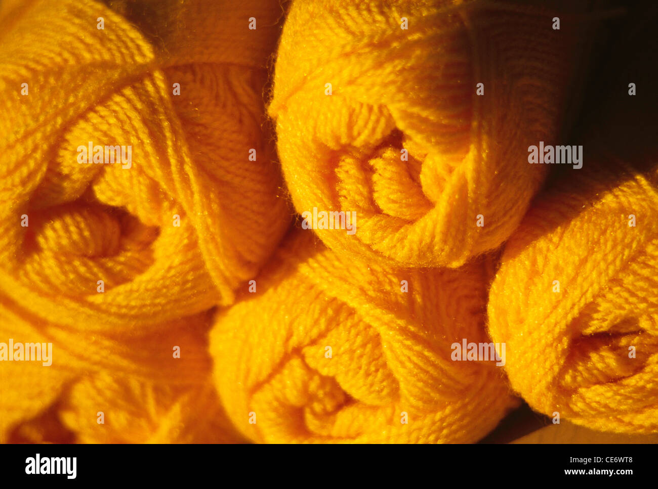 NVM 85355 : yellow colour knitting wool thread balls Stock Photo