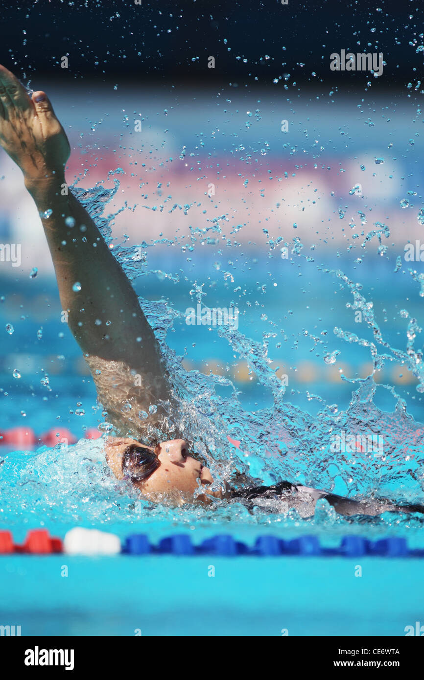 Young Woman Swimming in Pool Stock Photo - Alamy