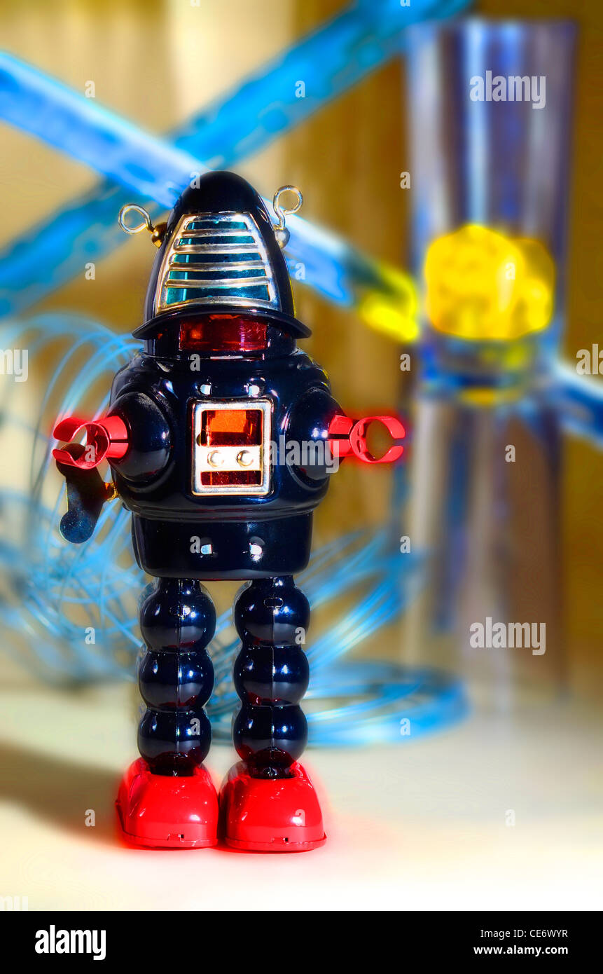 Robby the robot tin toy in Sci fi setting Stock Photo