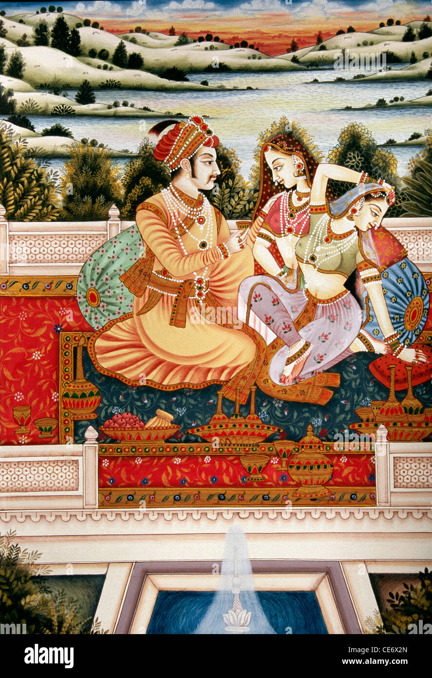 Miniature painting of Mughal Emperor King Maharaja with his wife Empress Queen Maharani two wives Queens relaxing in the garden ; India ; Asia Stock Photo