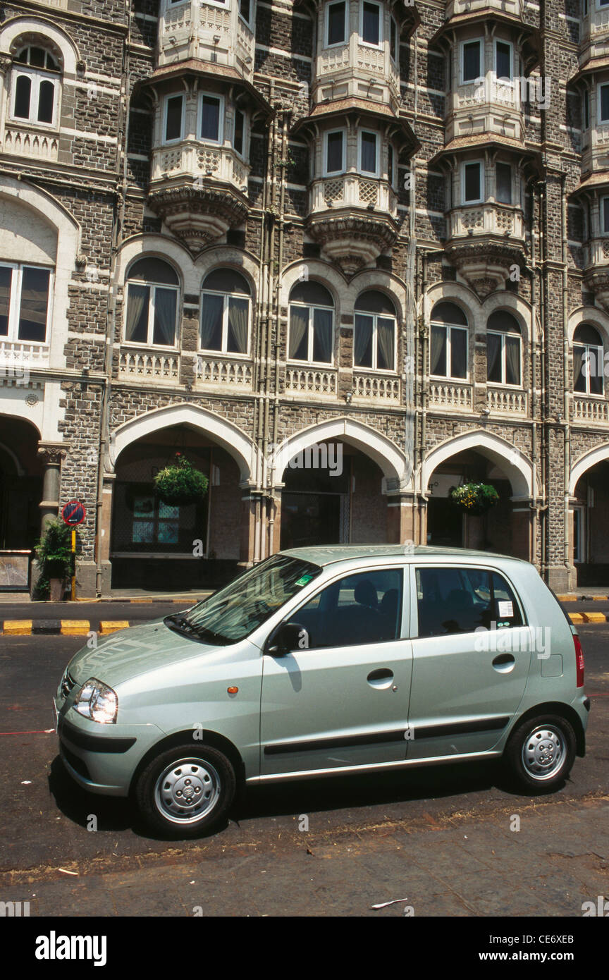 Pale green Santro Hyundai hatchback car parked on the road below Taj Mahal Hotel ; bombay ; mumbai ; maharashtra ; india ; asia Stock Photo