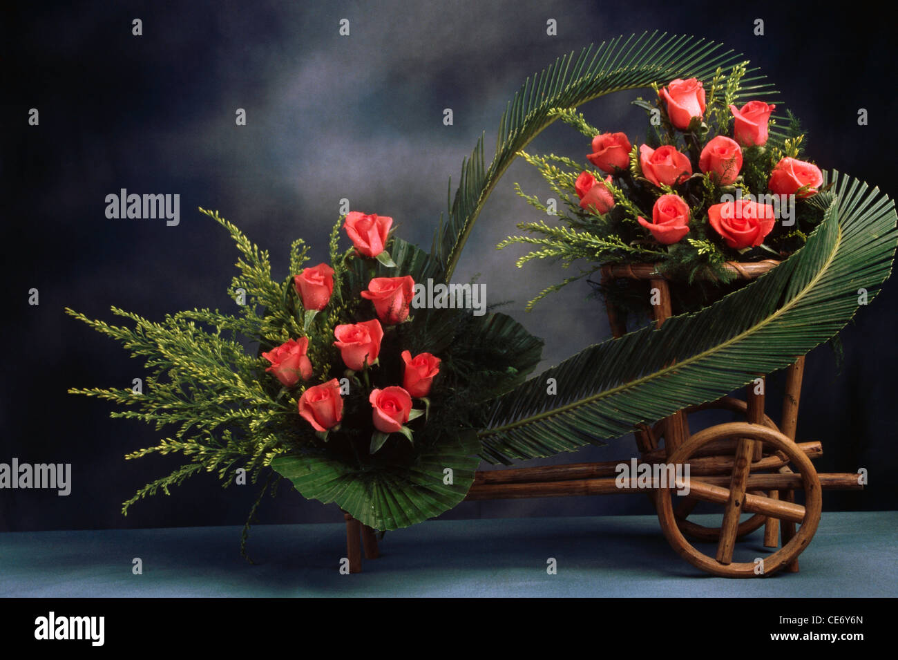 Artificial flowers ; artificial red roses flower arrangement Stock Photo