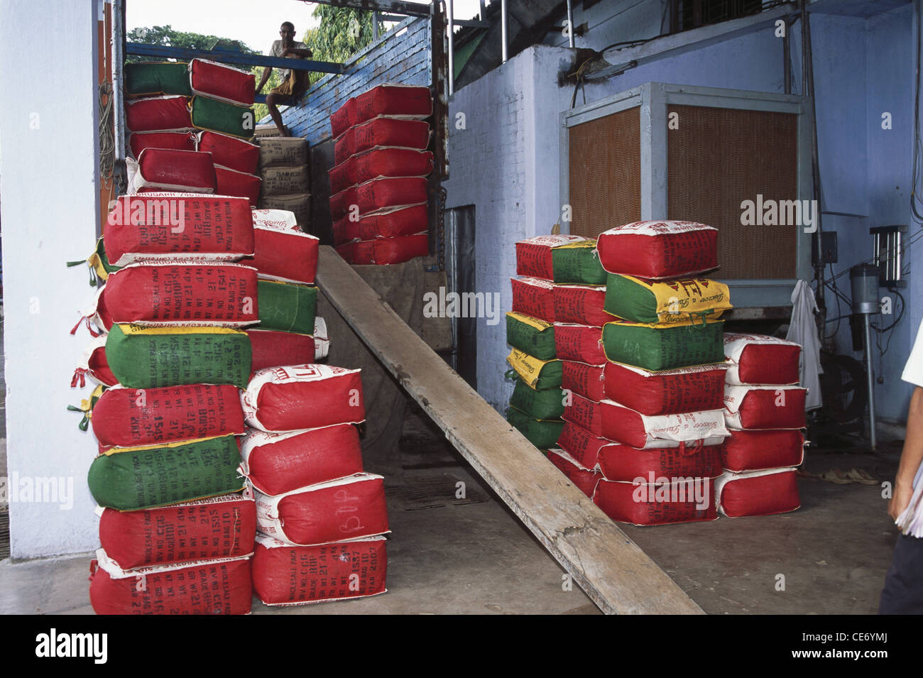 Tea packed in jute sacks ready for sale export distribution ; assam ; india ; asia Stock Photo