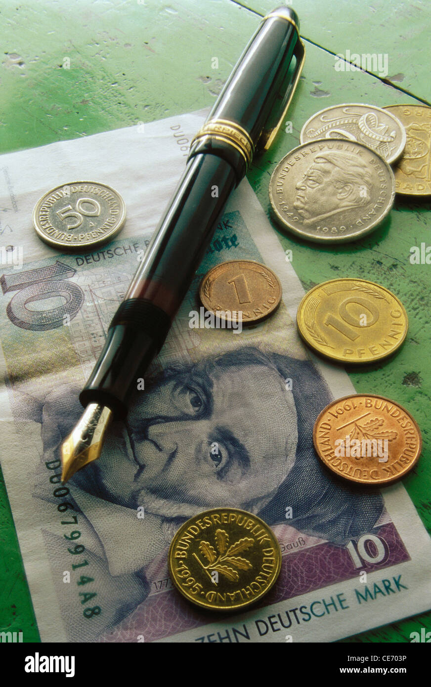 AAD 83929 : Mont Blanc pen German paper money ten Deutsche Mark note coins 1 one 10 ten 50 fifty Stock Photo