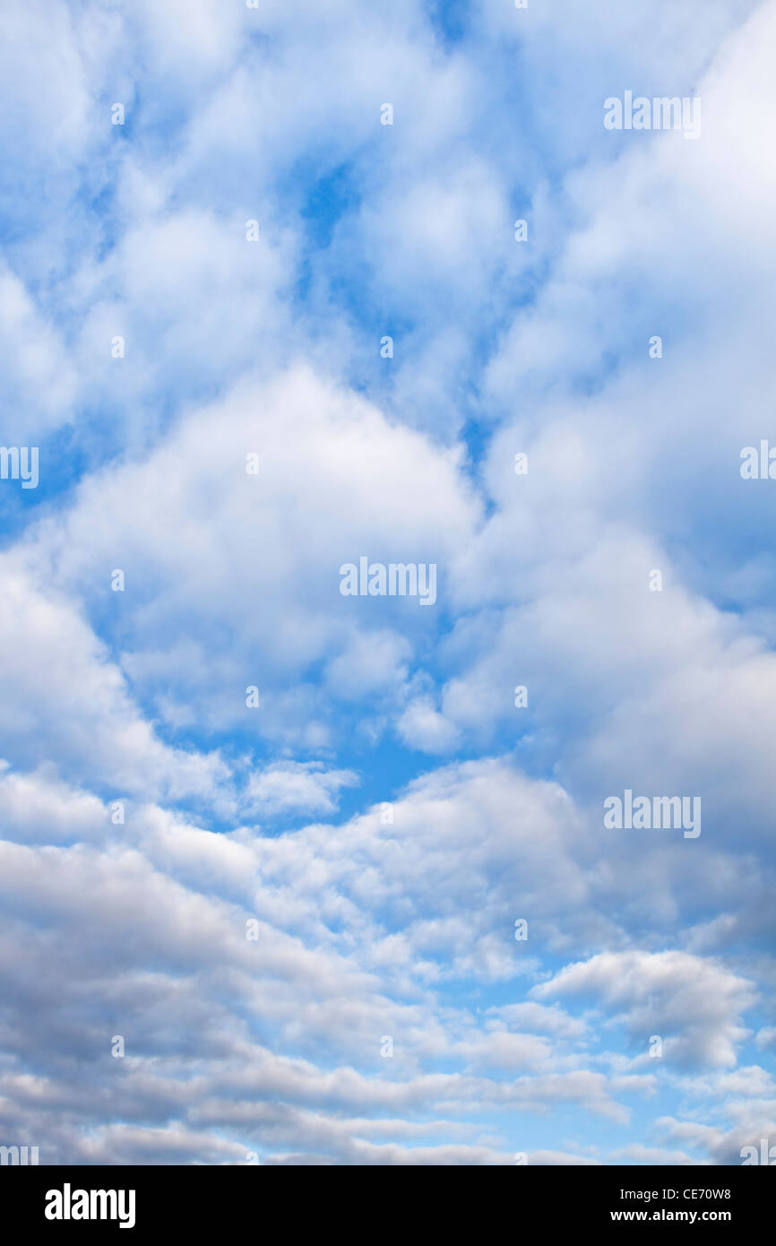 A blue sky with white cumulus clouds Stock Photo - Alamy