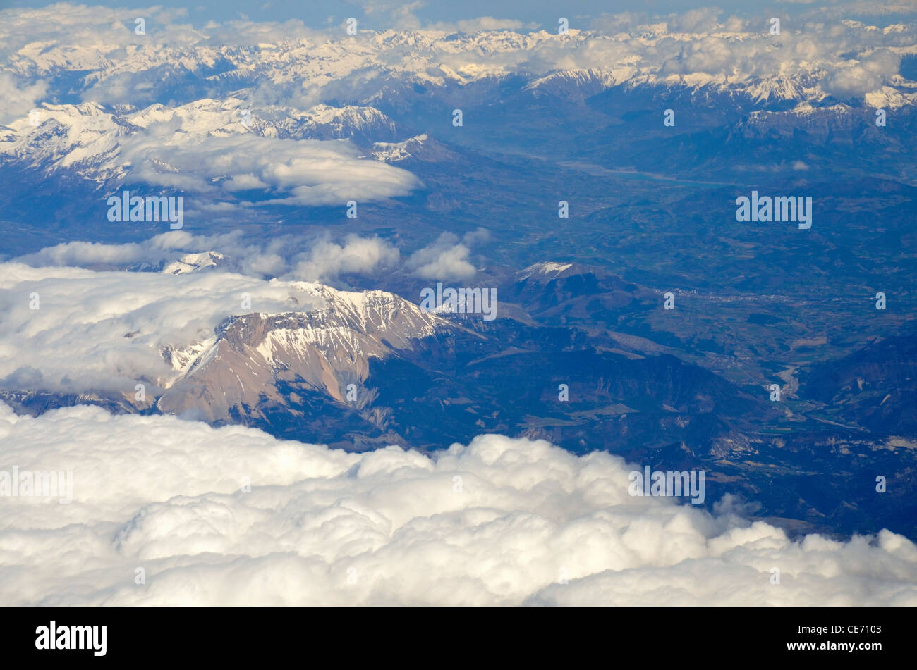 Snow on French Alps summits at spring, France, (aerial view Stock Photo ...