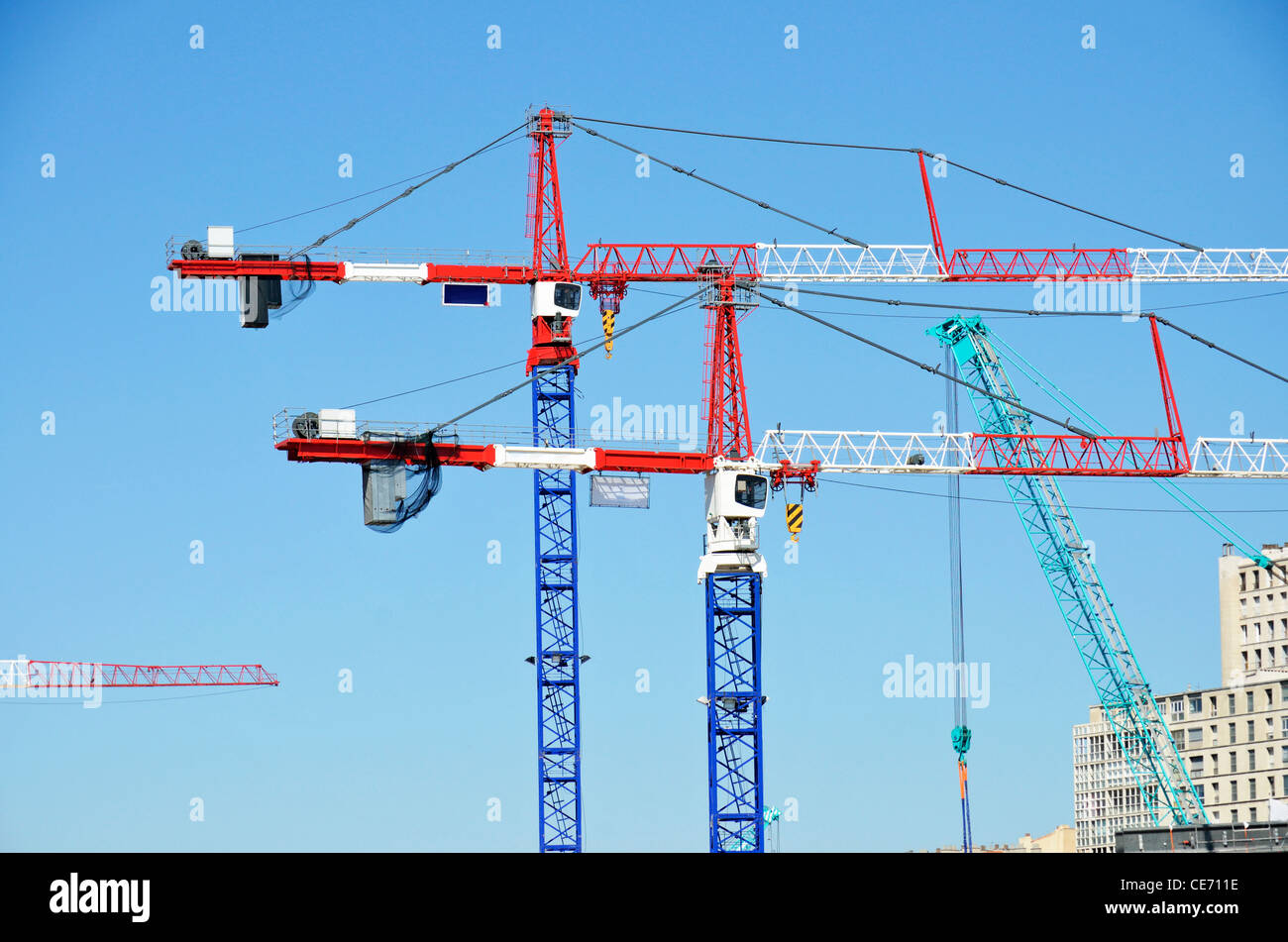 Two similars construction cranes Stock Photo