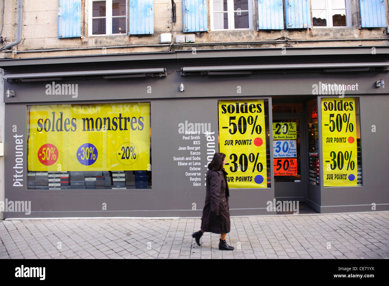 Stock photo of sale signs in french shop windows Stock Photo - Alamy