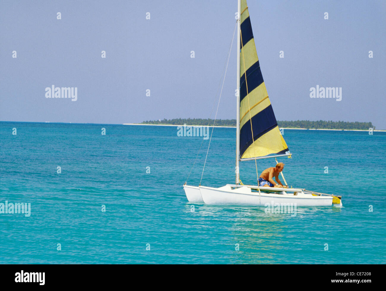 Man sitting on a boat hi-res stock photography and images - Alamy