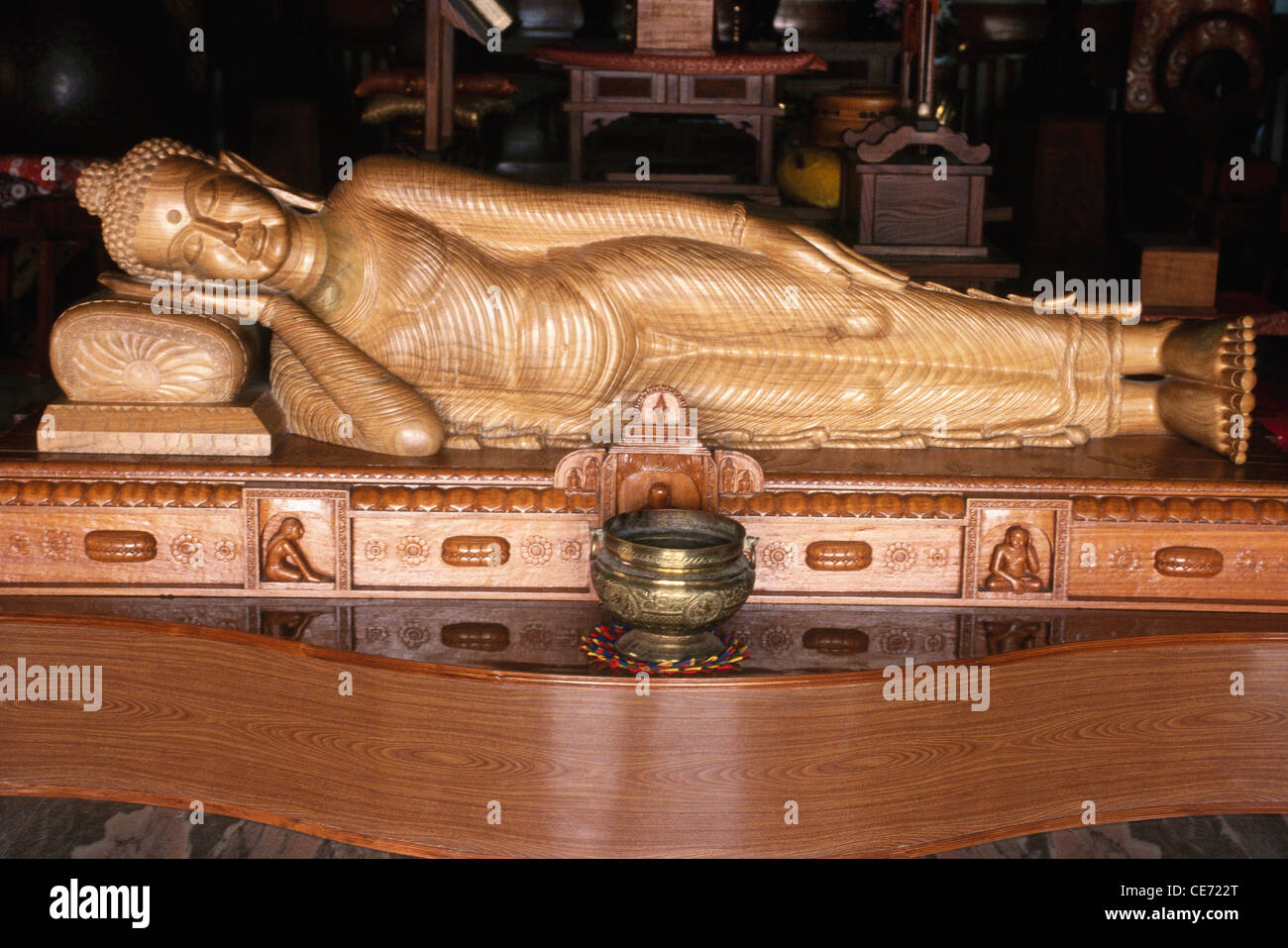 nirvana reclining sleeping buddha ; sandalwood statue ; Horinji Japanese temple ; sarnath ; uttar pradesh ; india ; asia Stock Photo