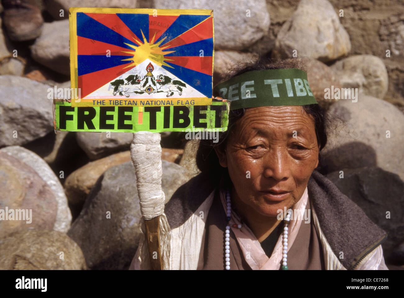 RSC 81746 : Tibetan woman holding free Tibet flag ; free Tibet day  10 th march ; dharamshala ; himachal pradesh ; india Stock Photo