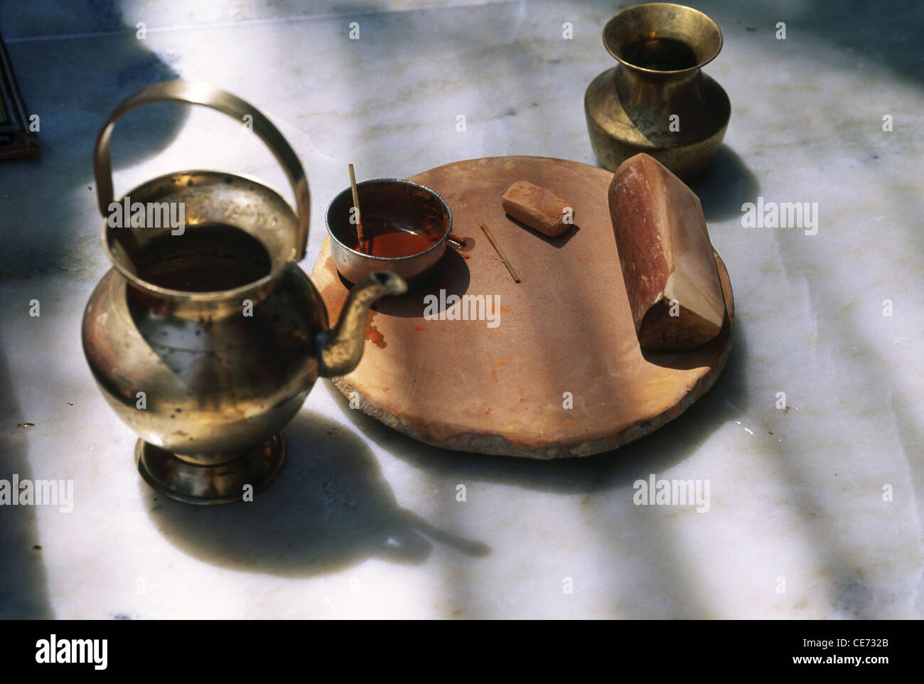 VHM 81806 : sandalwood paste making plate and water container kalash India Stock Photo