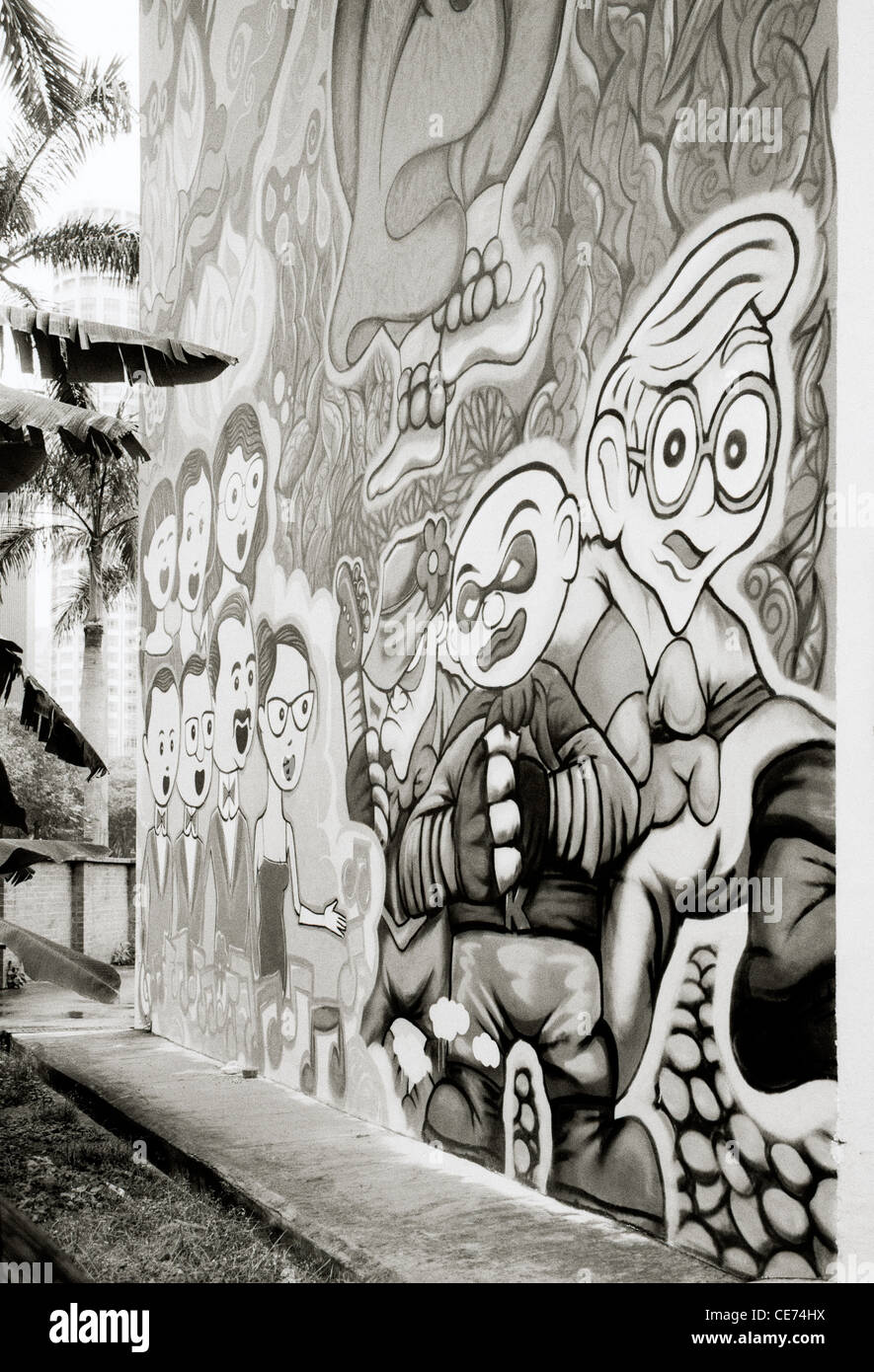 Urban graffiti street art in Chinatown in Singapore in Far East Southeast Asia. Cartoon Character Travel Stock Photo