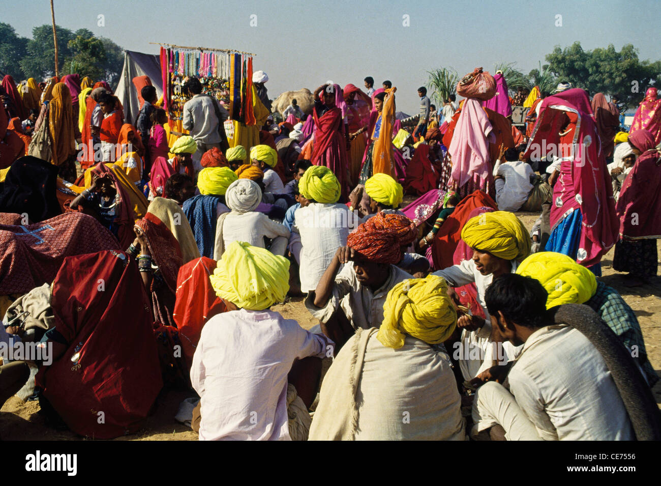 SNS 82934 : indian men sitting in yellow turbans at chaksu fair rajasthan india Stock Photo