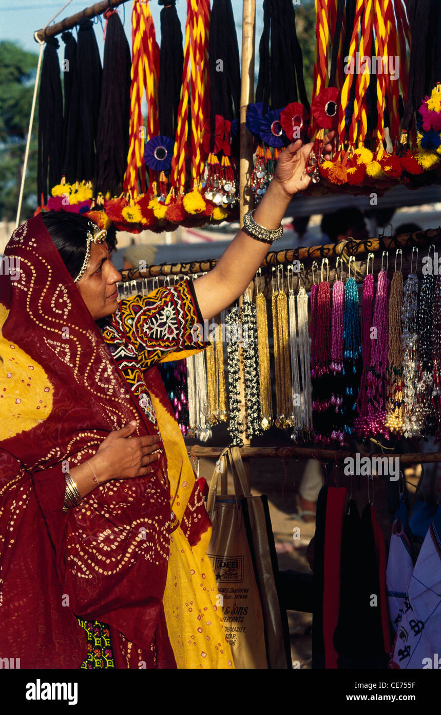 indian rajasthani women shopping in Pushkar fair rajasthan india Stock