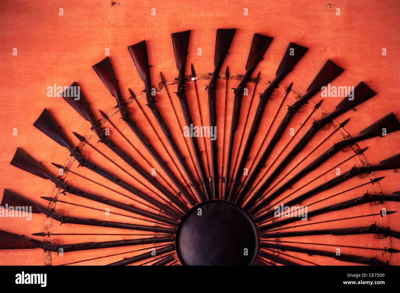 NMK 82252 : sun symbol of indian king made by guns arrow and shield savatobhadra building city palace jaipur rajasthan india Stock Photo