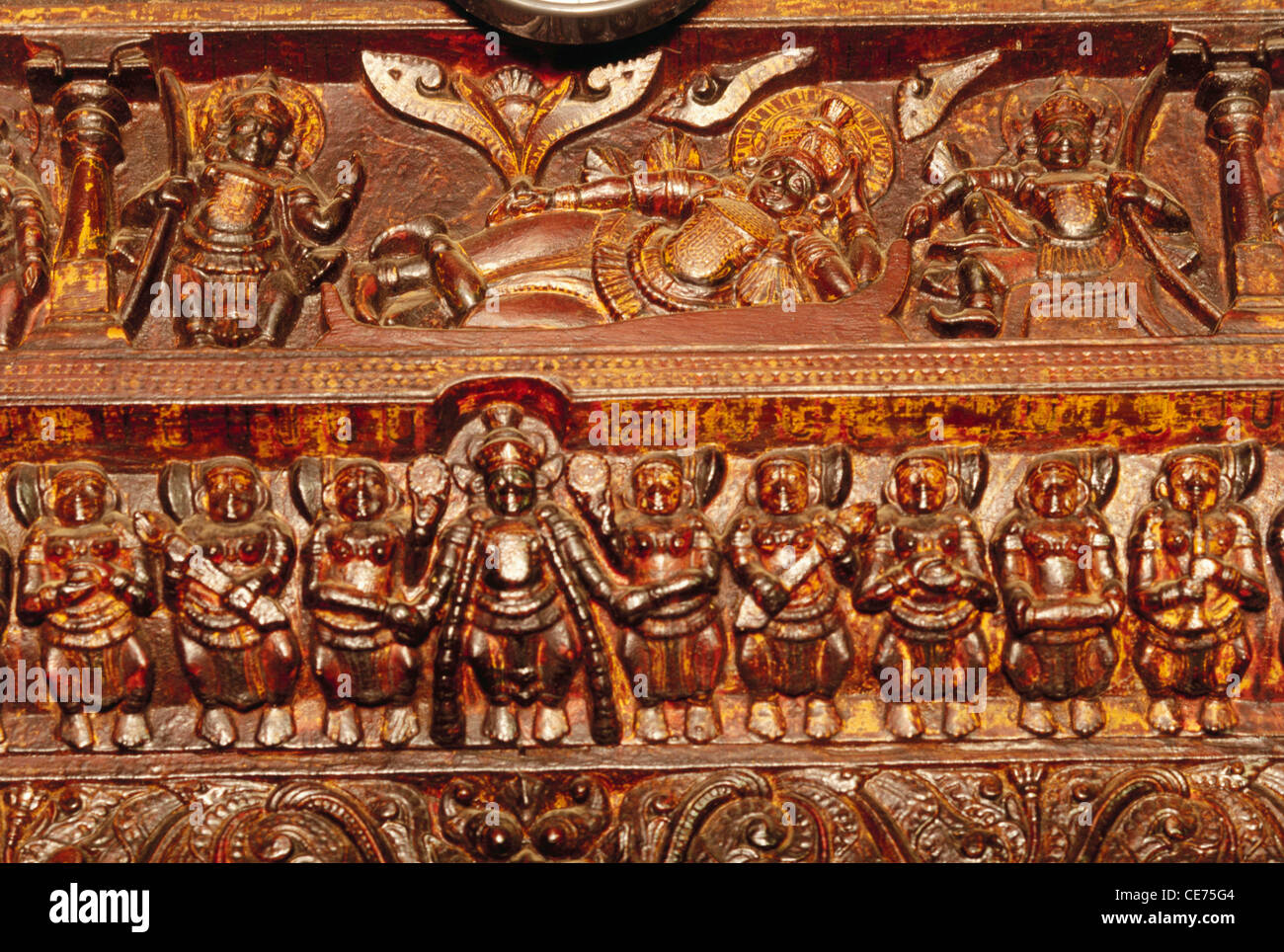 wood carving Lord Vishnu reclining palghat kerala india asia Stock Photo