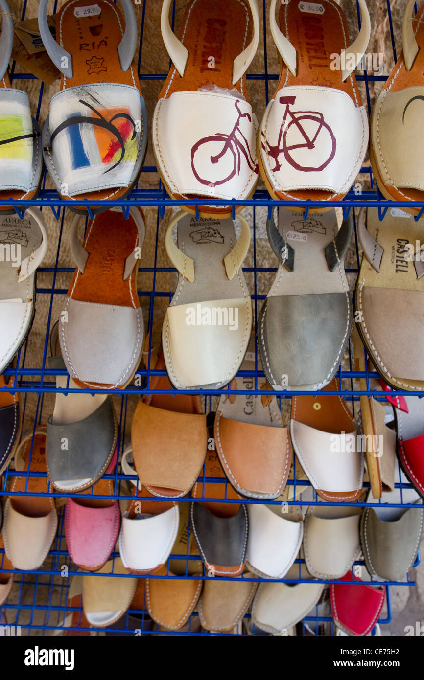 Outside stall of shoes and sandals in Cuitadella, Menorca, Spain