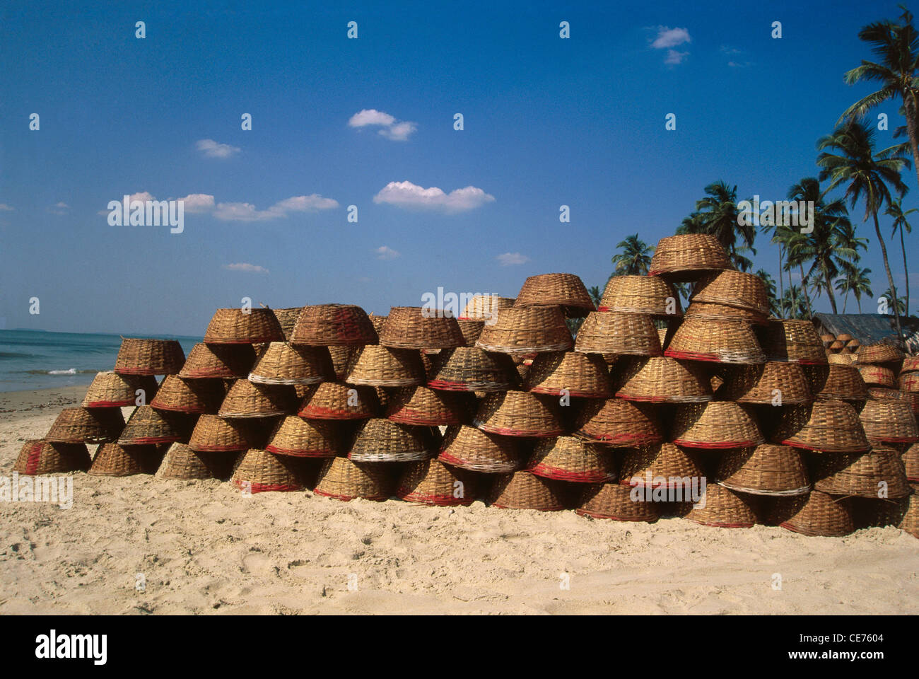 MMN 82381 : row of empty fishing cane round indian baskets at colva beach kerala india Stock Photo
