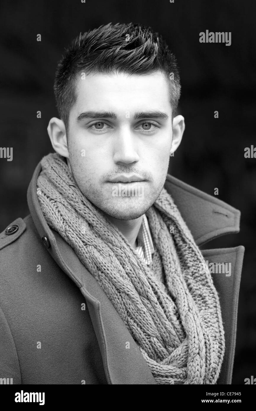 Male model striking a pose in an urban setting, in Leeds, West Yorkshire, England Stock Photo