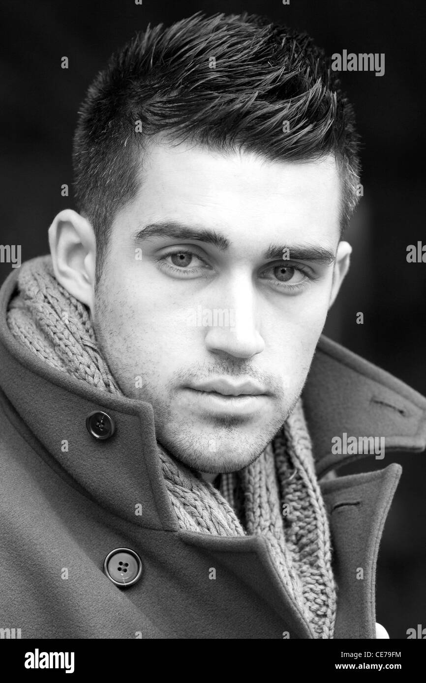 Male model striking pose in Black and White Stock Photos & Images Alamy