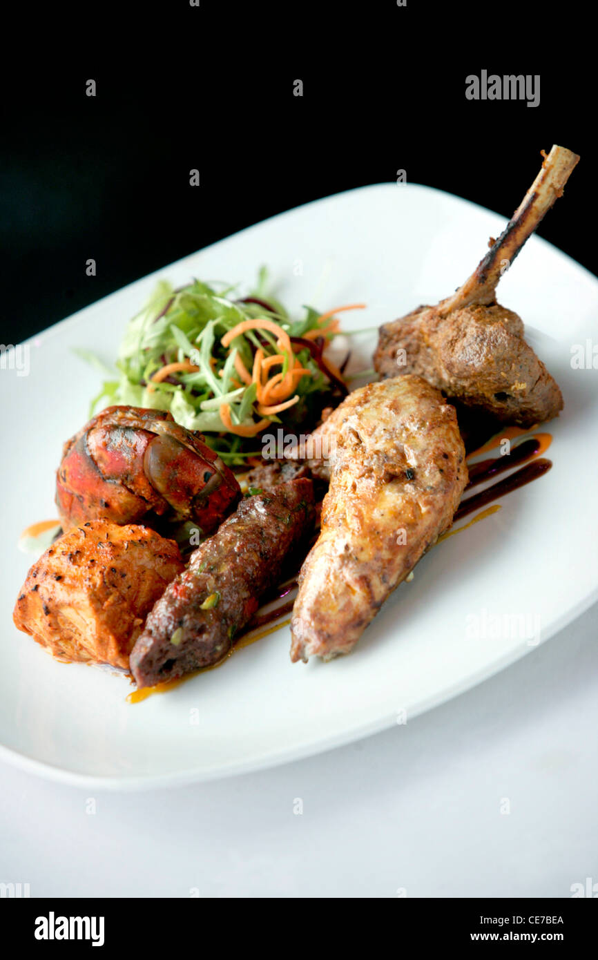 GRILL PLATTER OF SMOKED SALMON, GRILLED PRAWNS, TANDOORI CHICKEN AND