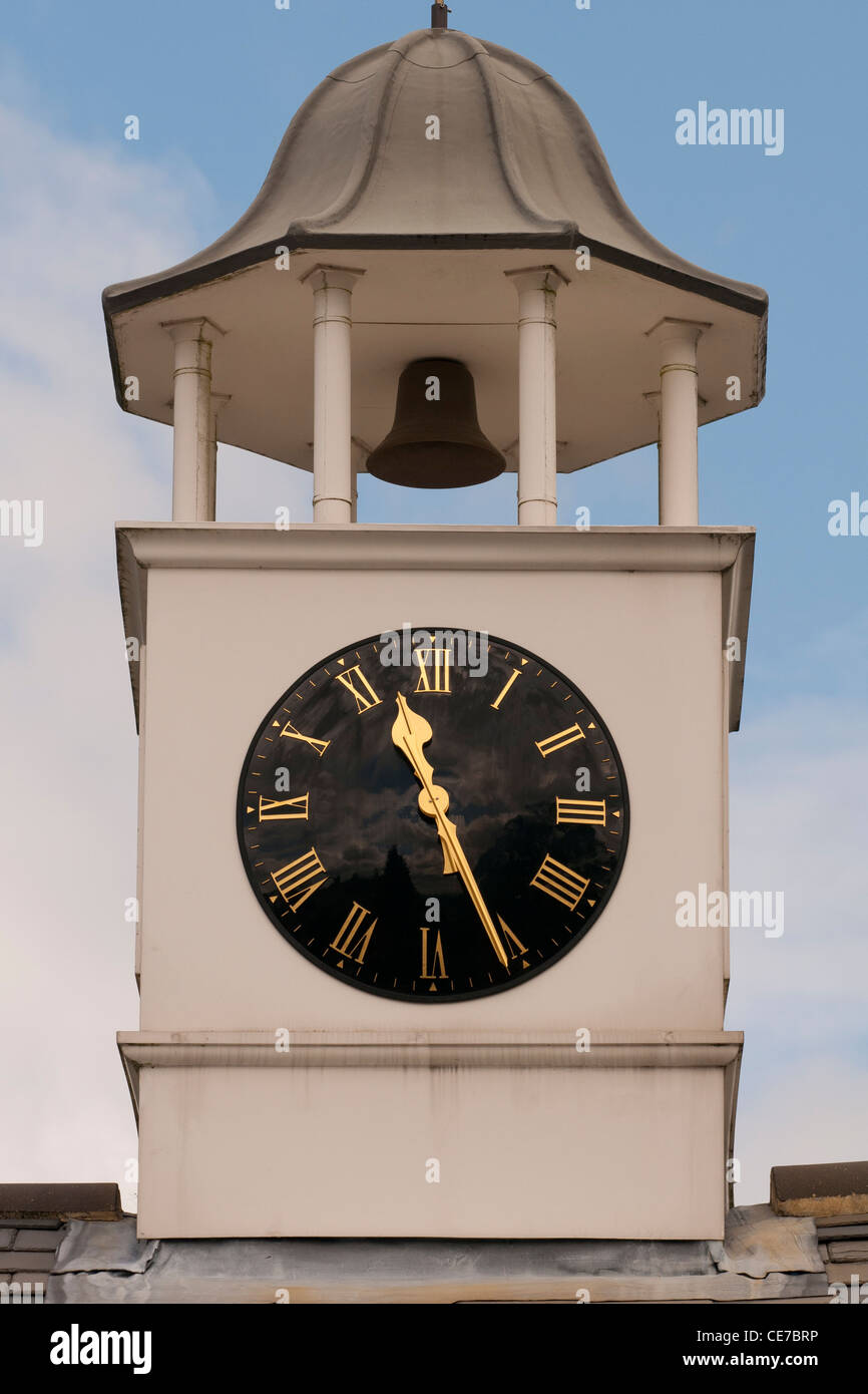 Old clock tower in operation in West Sussex, UK. Stock Photo