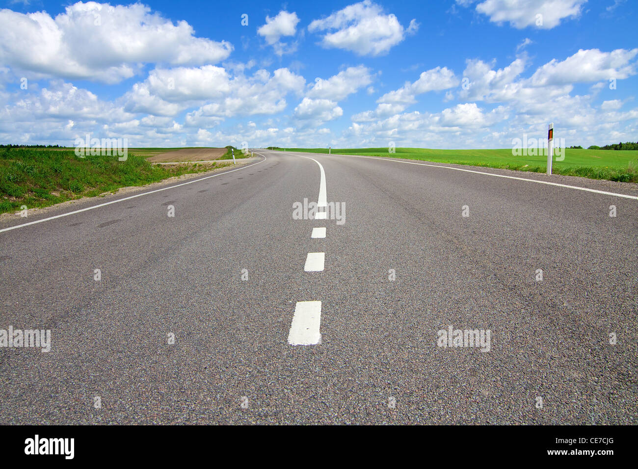 Long road stretching out into the distance Stock Photo