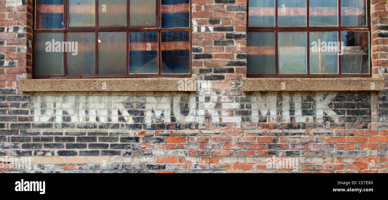 IA, Dubuque, Millwork District, old sign Stock Photo Alamy