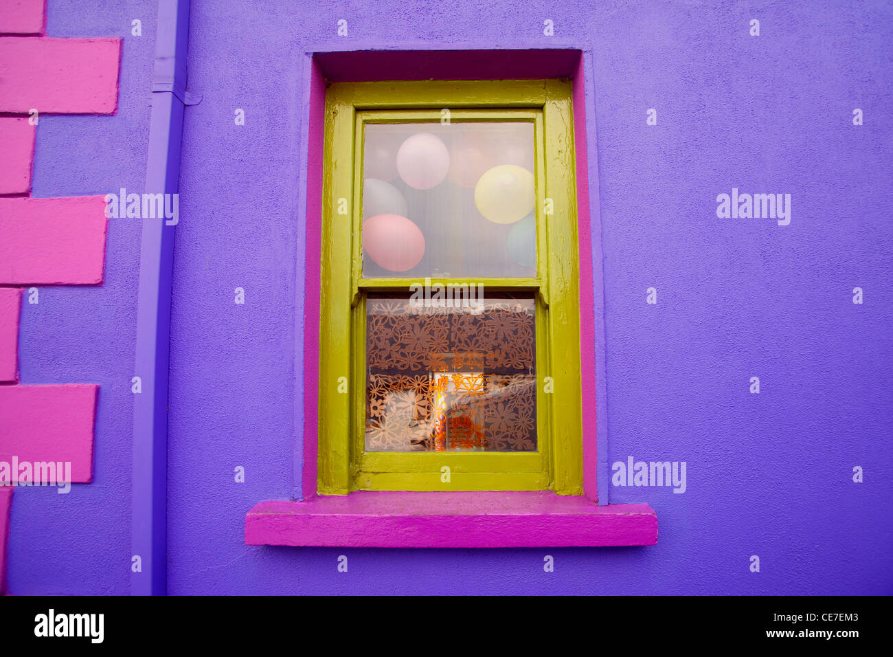 Purple and green  window, Westport, County Mayo, Ireland Stock Photo