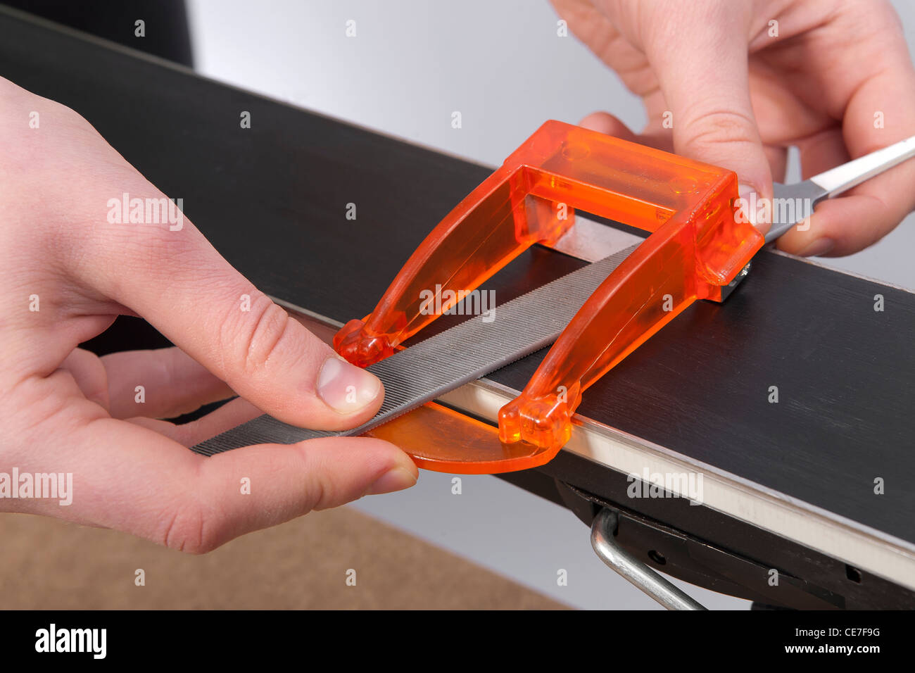 race ski edge base bevel sharpening with file and guide Stock Photo Alamy