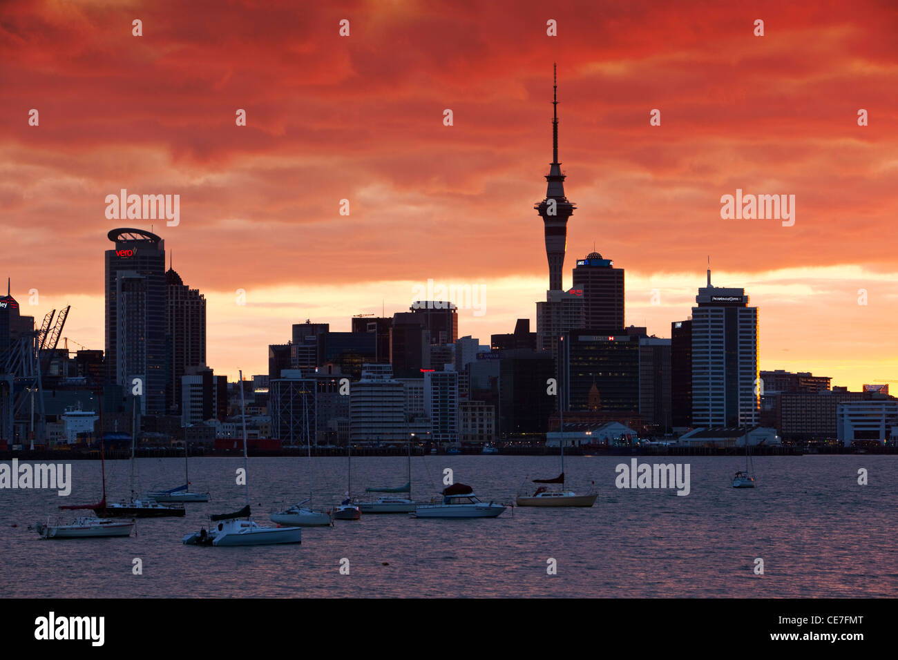 Auckland city skyline and harbour at dusk.  Auckland, North Island, New Zealand Stock Photo