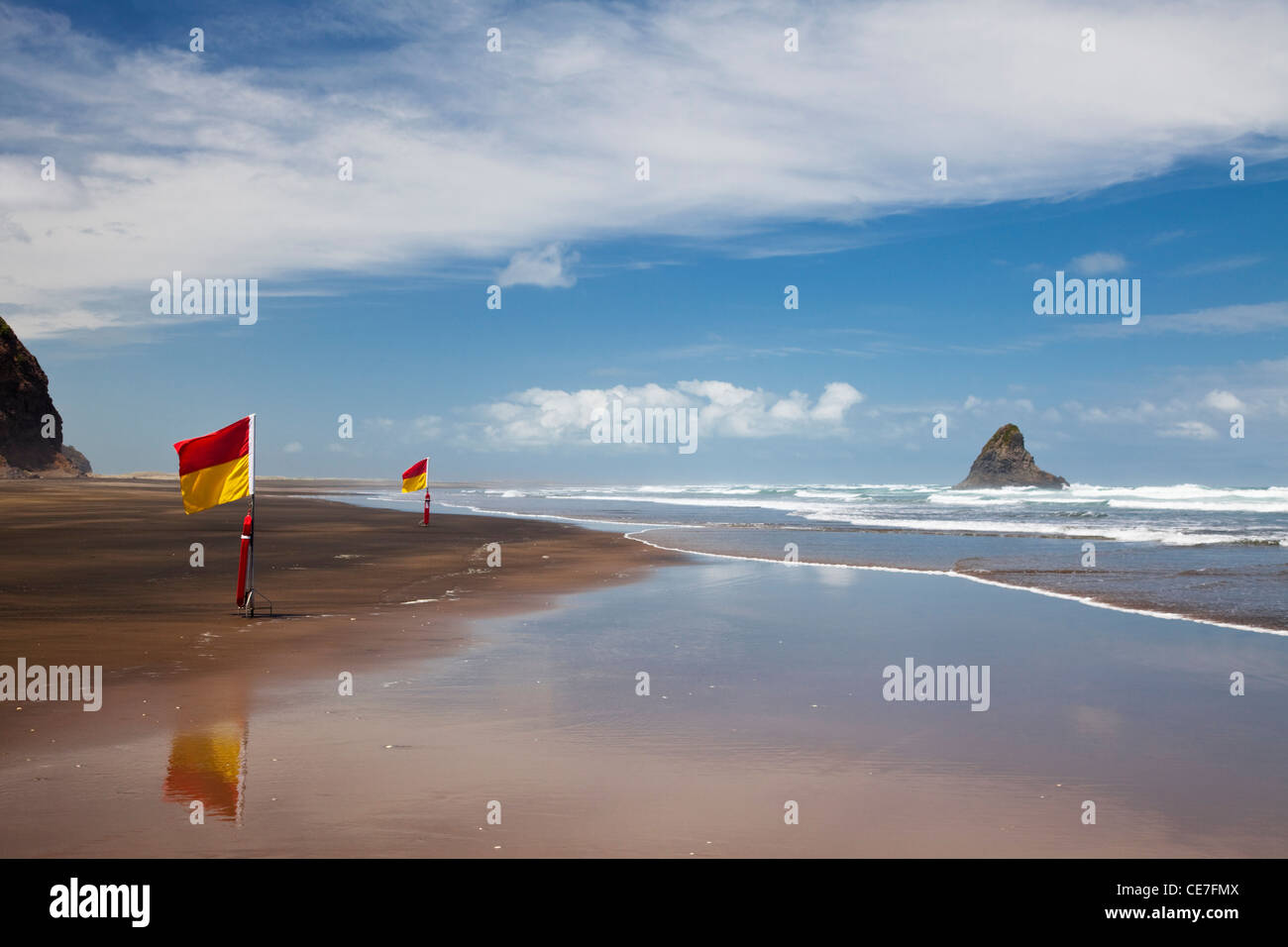 Surf lifesaving flags on Karekare beach. KareKare, Waitakere Ranges
