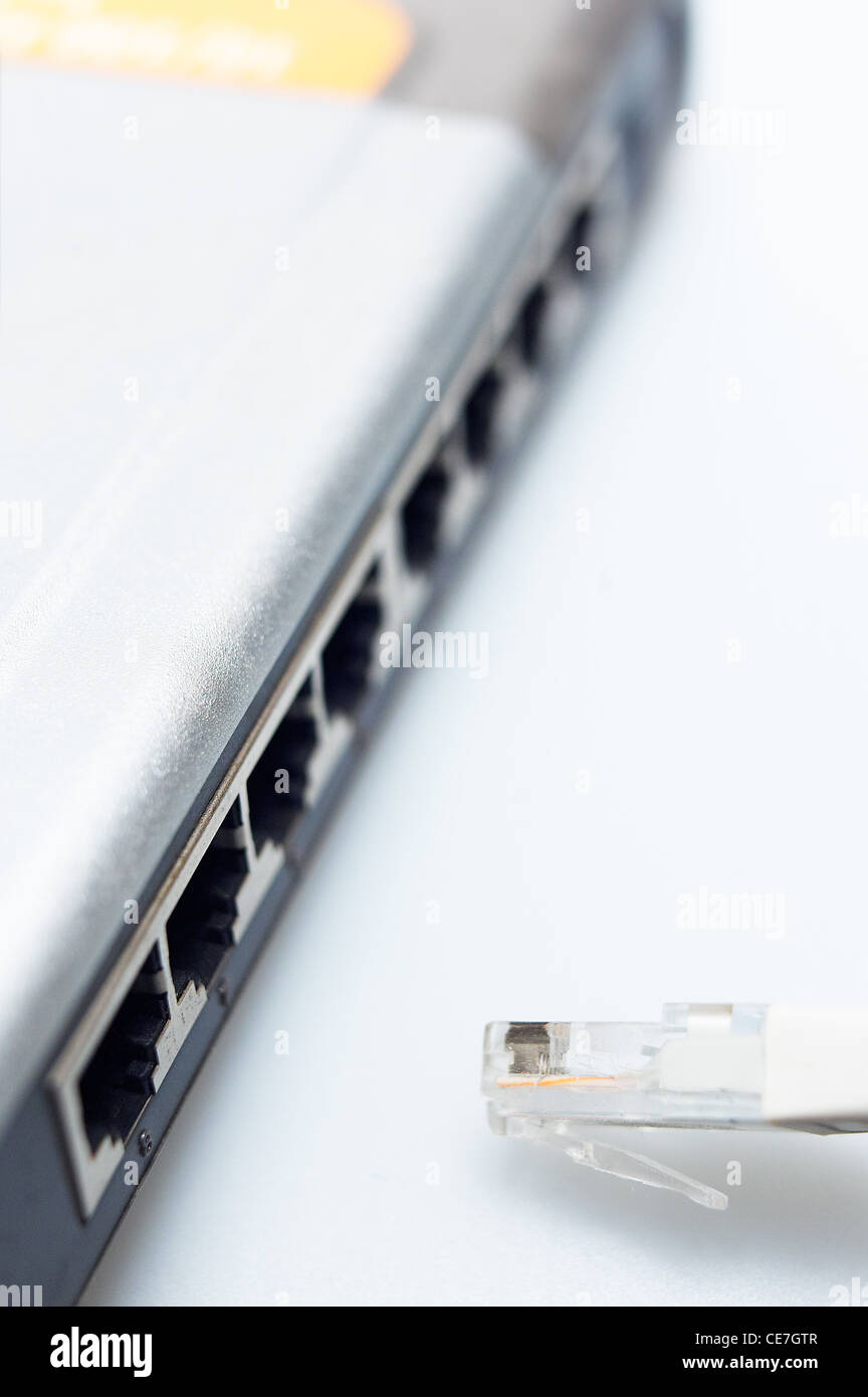 network hub switch with lan cable disconnected over white Stock Photo -  Alamy