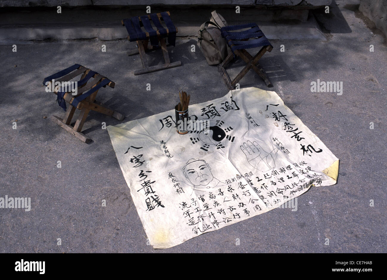 Fortune teller stall known as Suan ming with the Bagua diagram in China Stock Photo