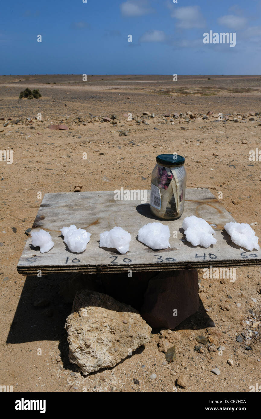 Tablet along the road with a display of salt crystals for sale