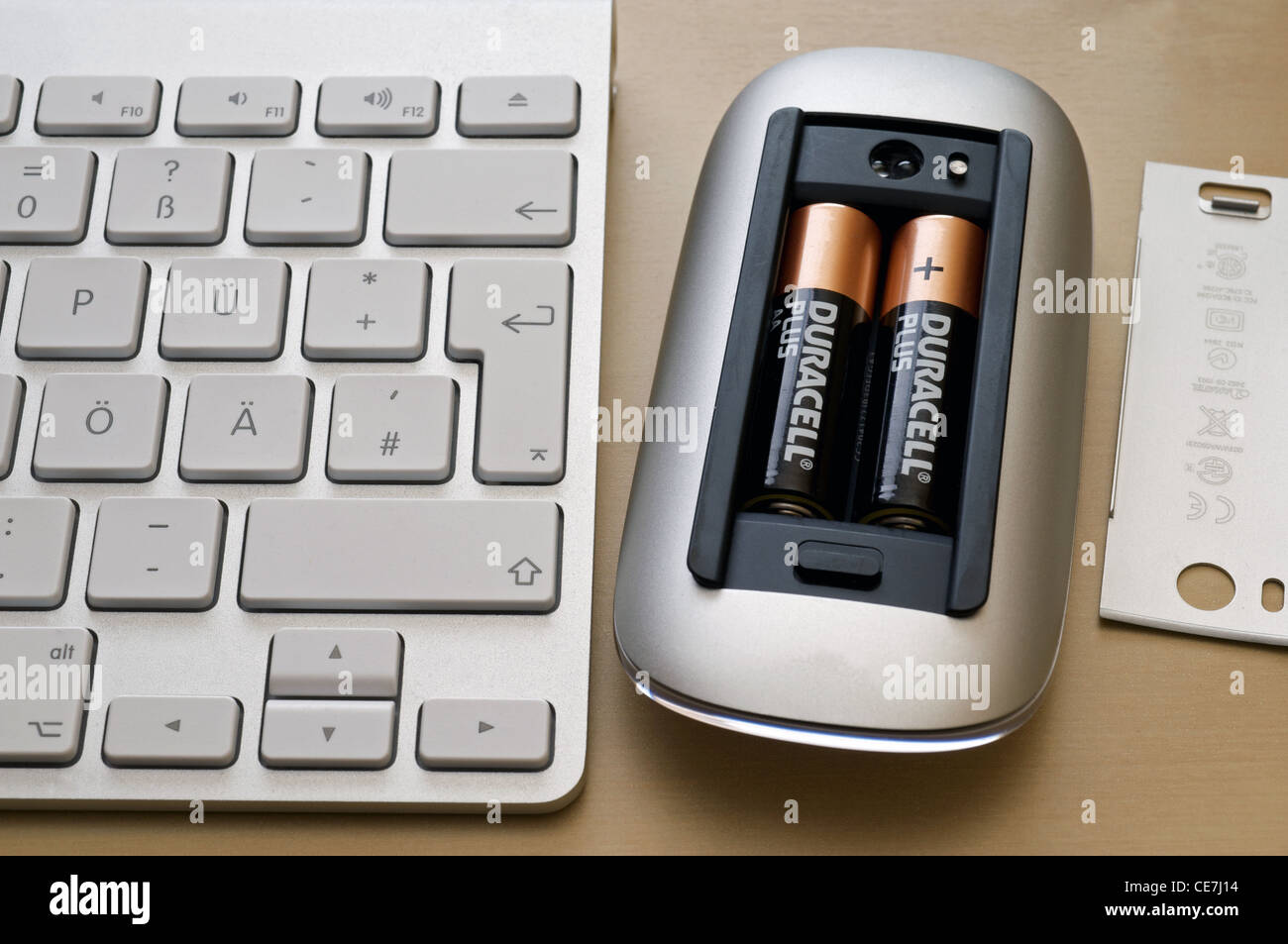Duracell batteries powering a wireless computer mouse Stock Photo Alamy