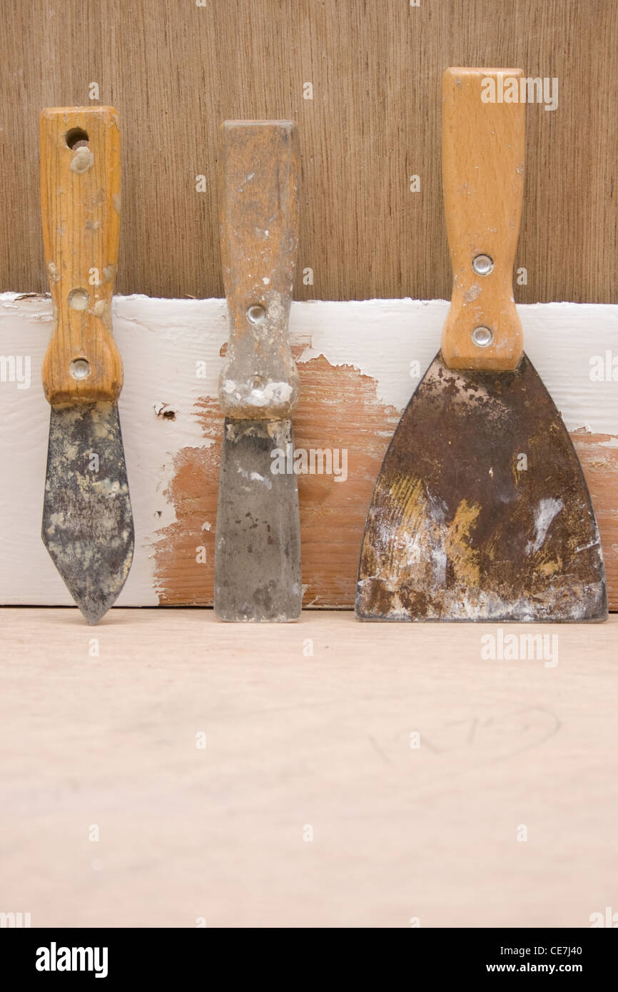 Hand tools including a putty knife,filler knife and a wallpaper scraper