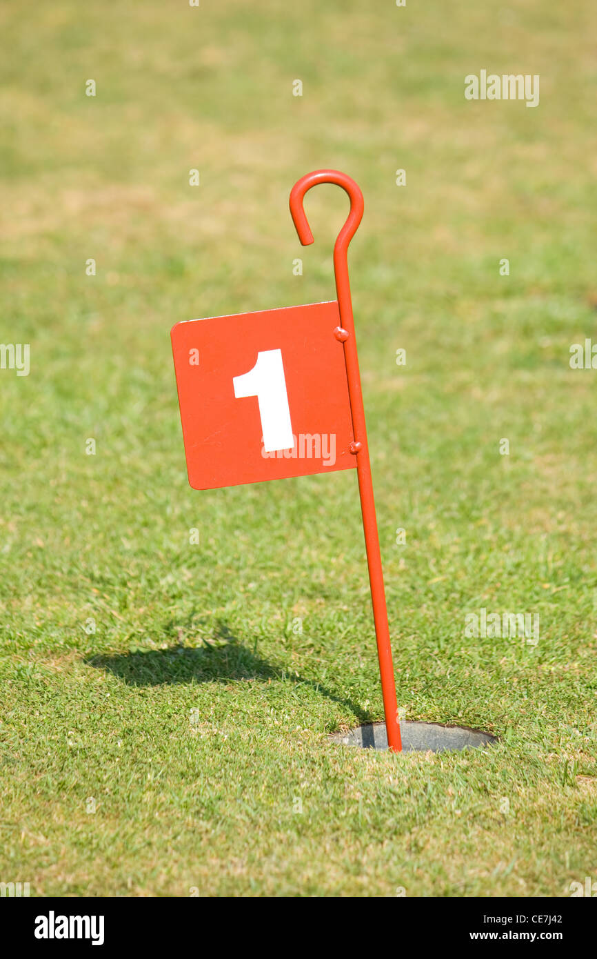 Number one pin and 1st hole on a putting green Stock Photo Alamy