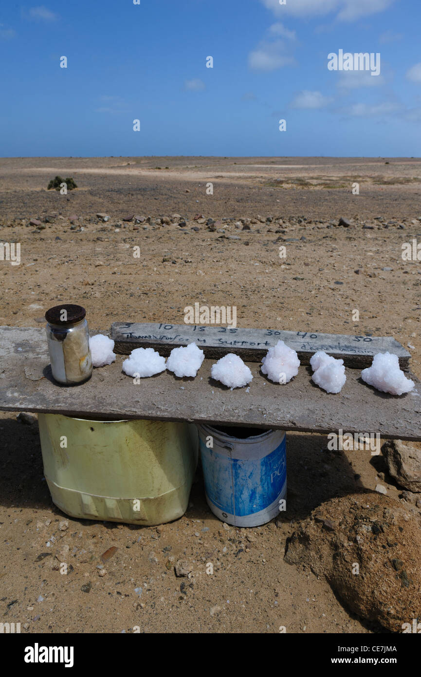 Tablet along the road with a display of salt crystals for sale