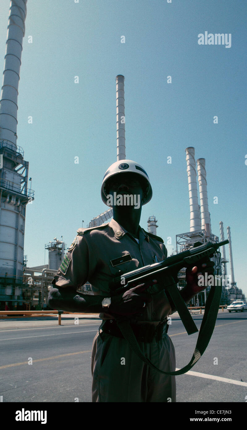 A Saudi Army soldier on duty at the largest oil refinery in the world, located at Ras Tanura, on the east coast of Saudi Arabia. Stock Photo