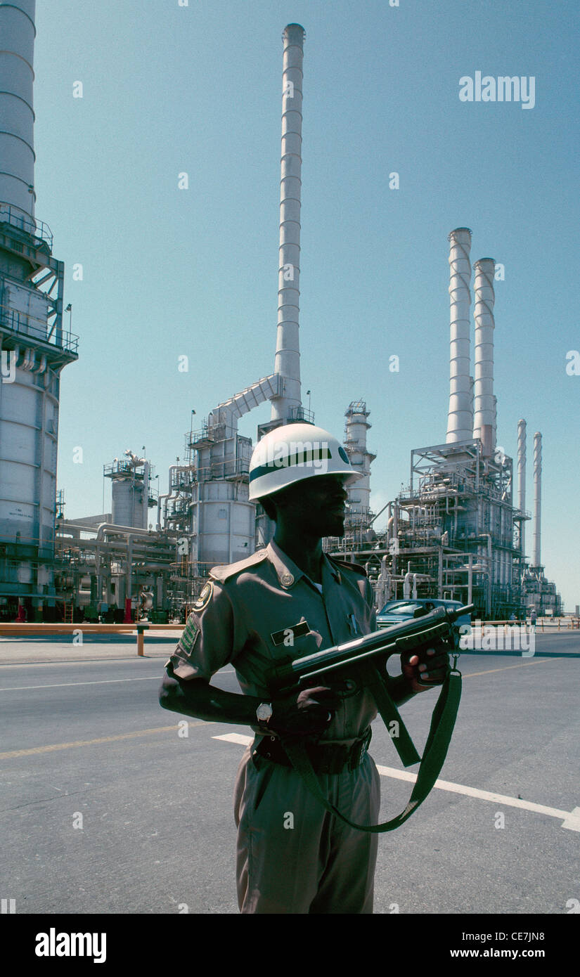 A Saudi Army soldier on duty at the largest oil refinery in the world, located at Ras Tanura, on the east coast of Saudi Arabia. Stock Photo