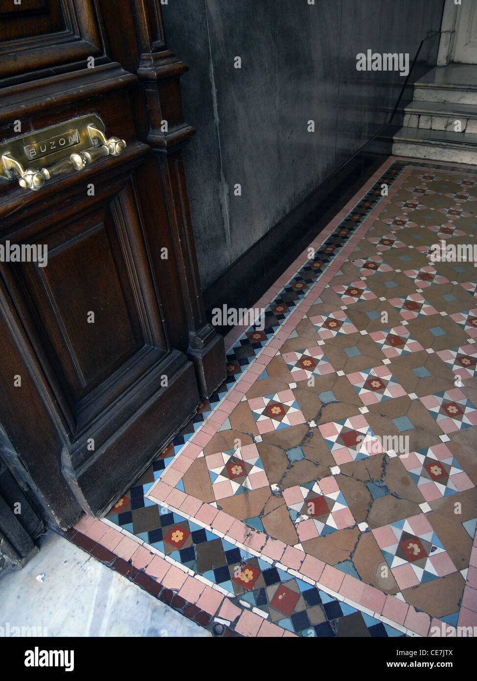 Old tiled floor and doors of building entrance, San Telmo, Buenos Aires, Argentina. No PR Stock Photo