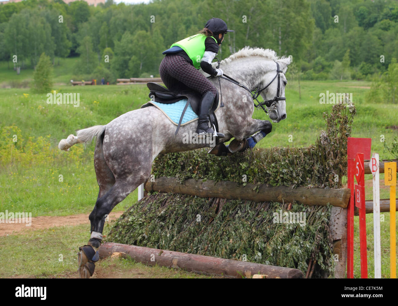 Horse and rider jumping an obstacle at a three day Eventing Competition