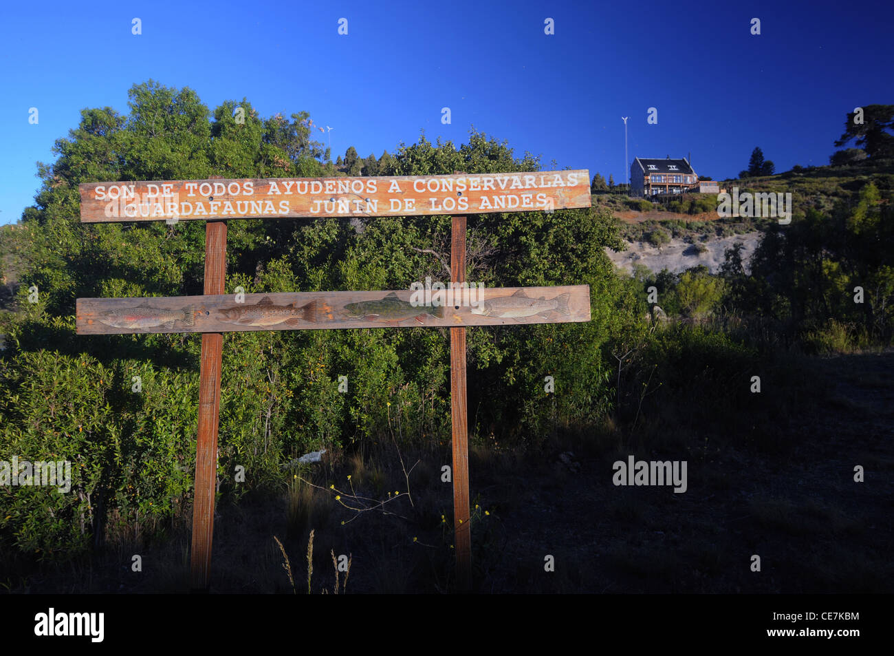 Sign about conservation of trout stocks, beside river near Junin los Andes, Neuquen, Argentina. No PR Stock Photo