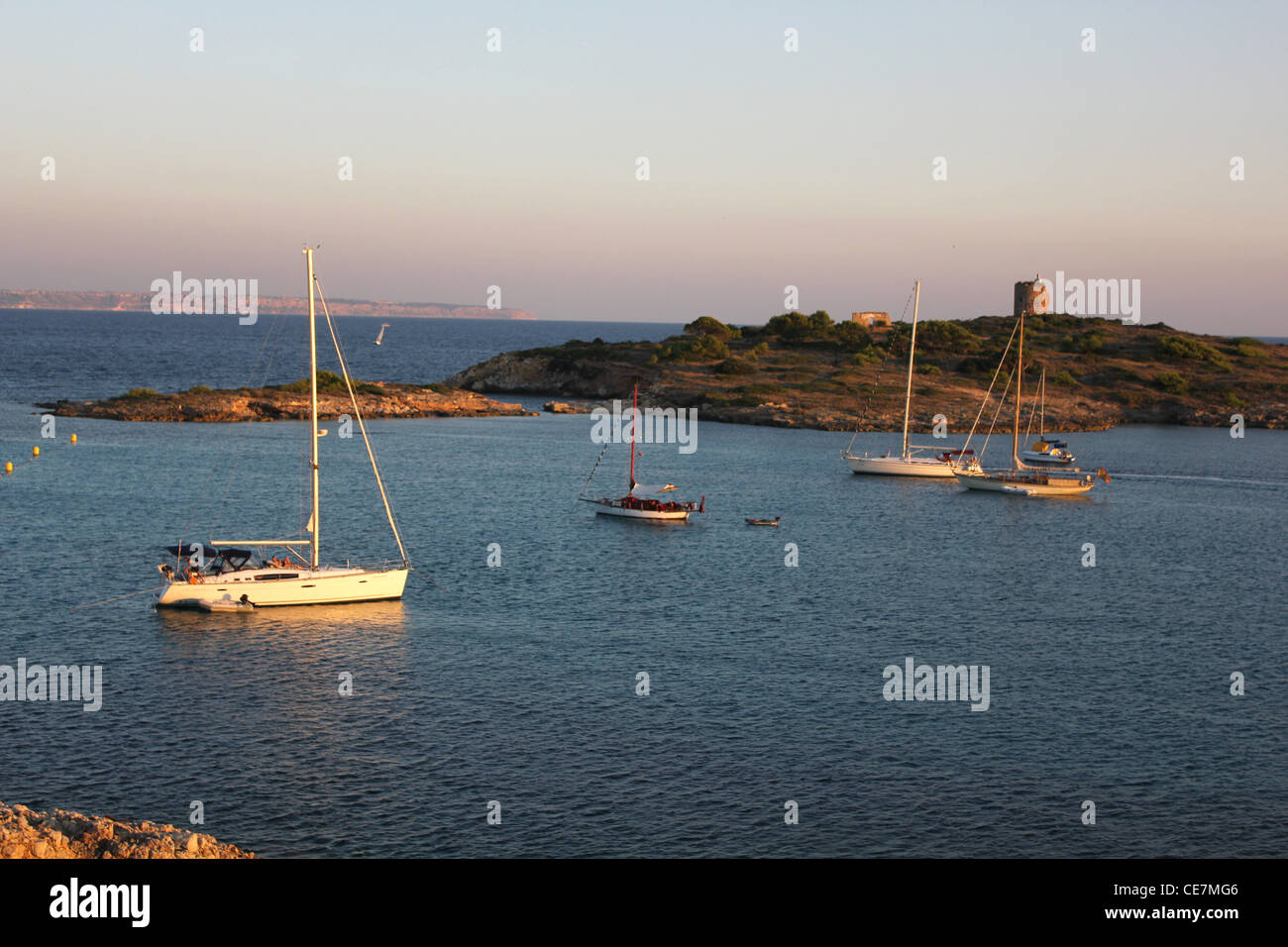 Coastal scene at evening - sailing yachts at anchor, near Illetas / Bendinat, Calvia, South West Mallorca / Majorca Stock Photo