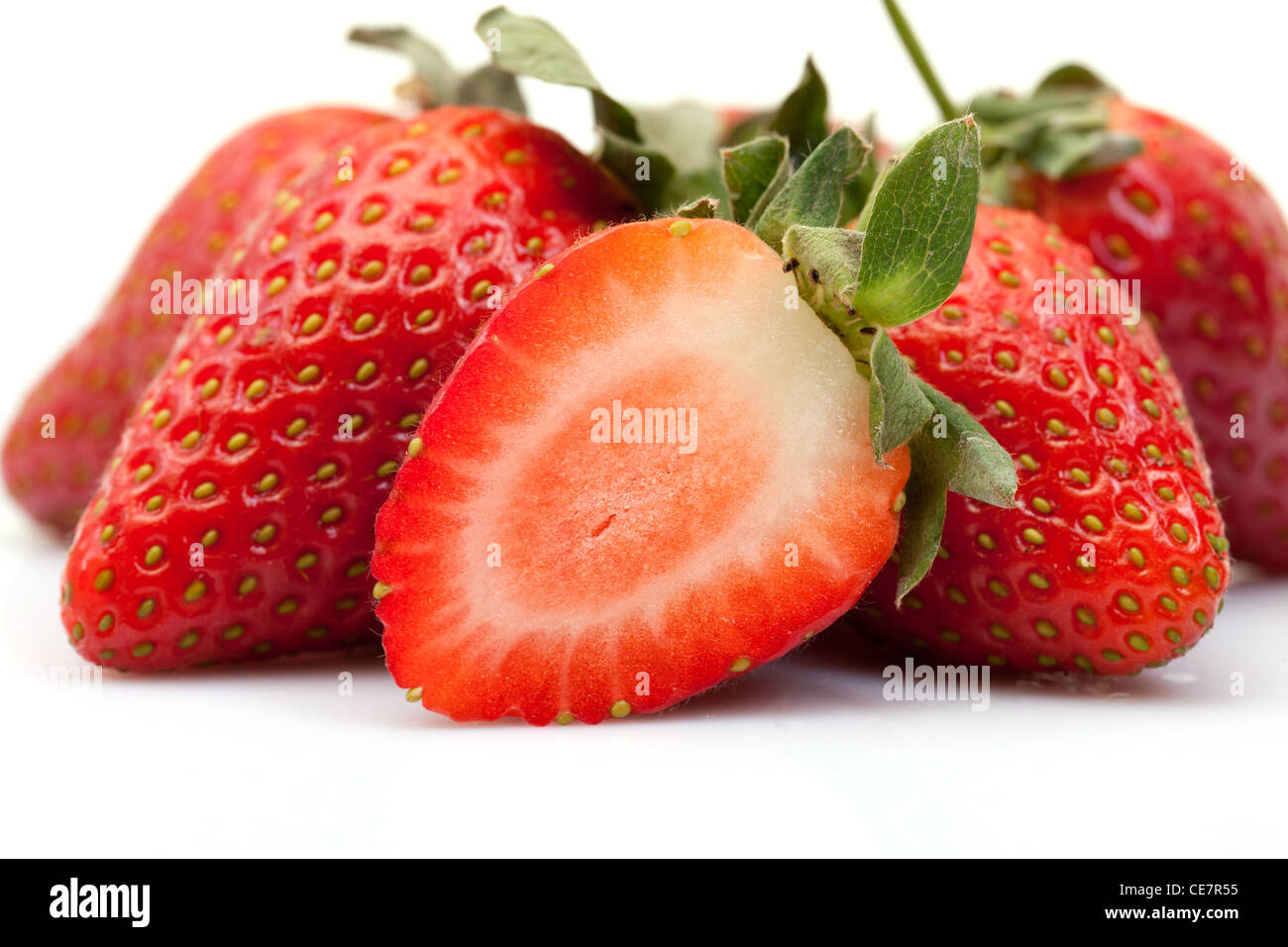 Strawberries closeup over white background Stock Photo - Alamy