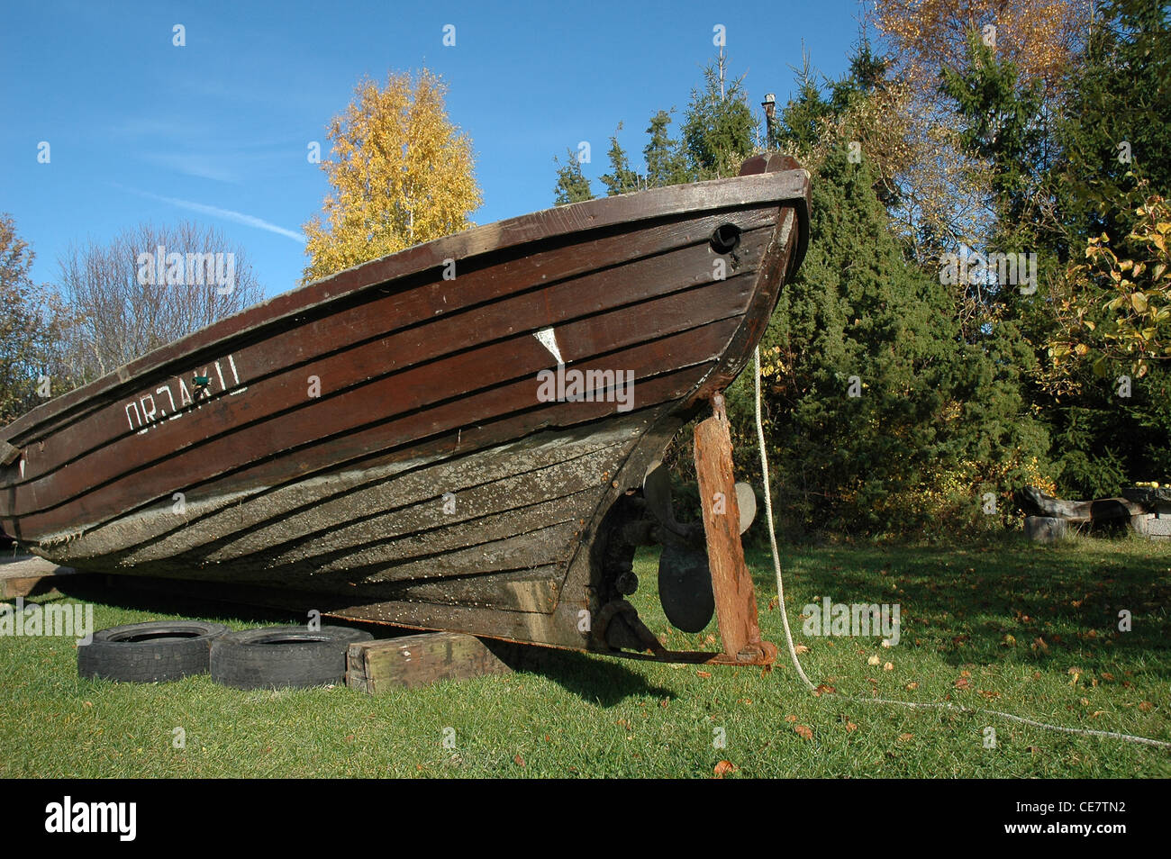 old wooden fishing boat on land Stock Photo
