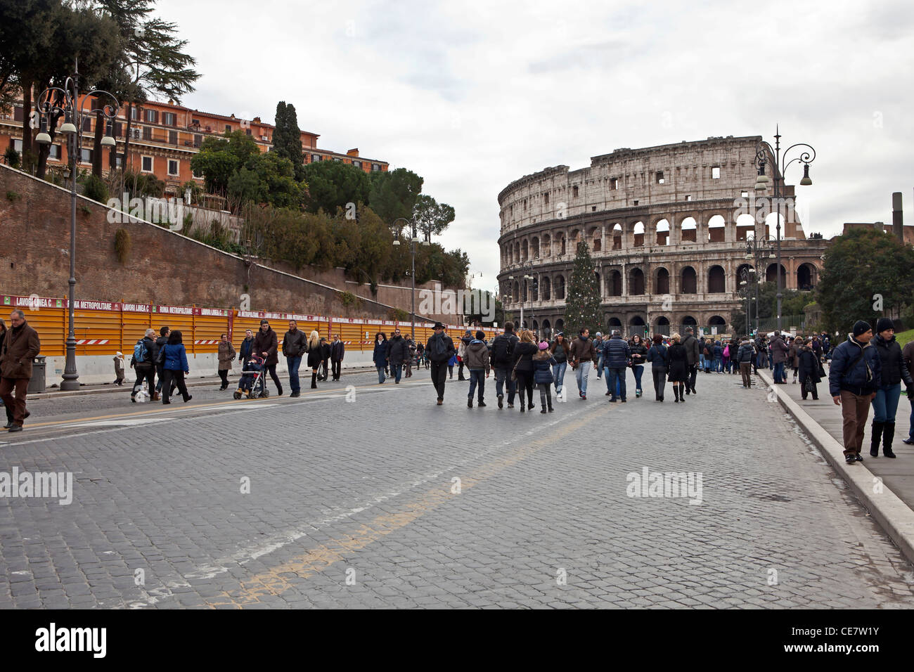 The traffic-free on a public holiday Via dei Fori Imperiali Richtng Colosseum in Rome, Lazio, Italy. Stock Photo