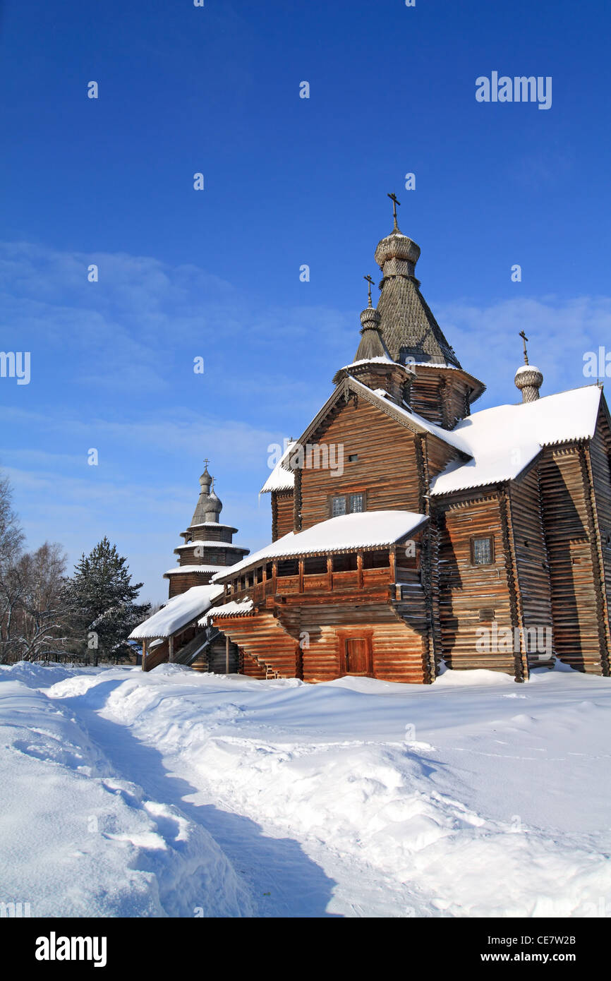 wooden chapel on snow field Stock Photo